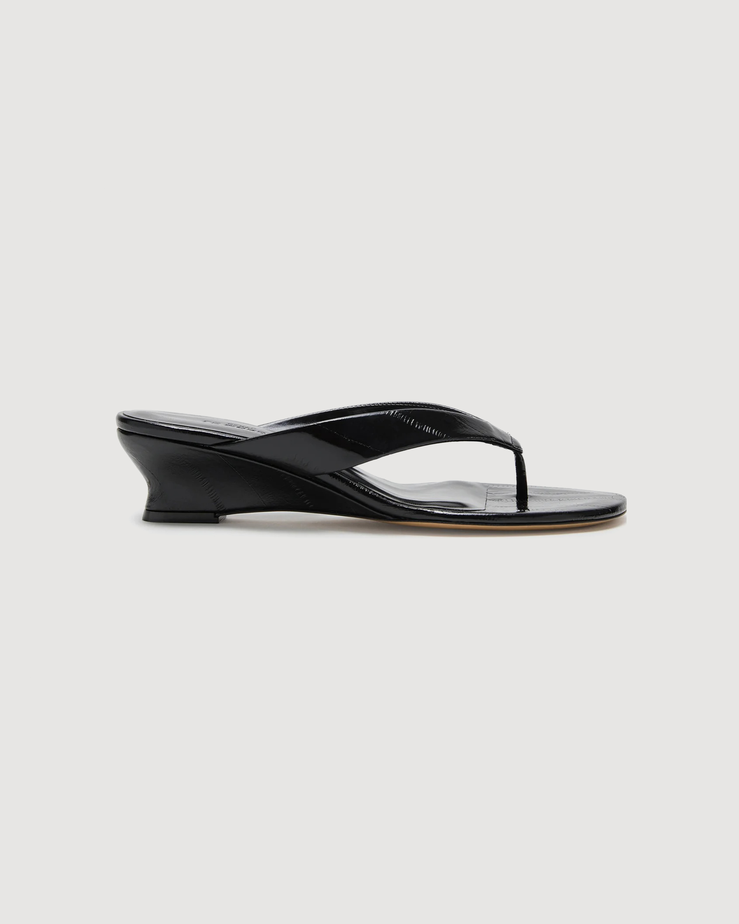 Wedge thong sandal with sculpted heel